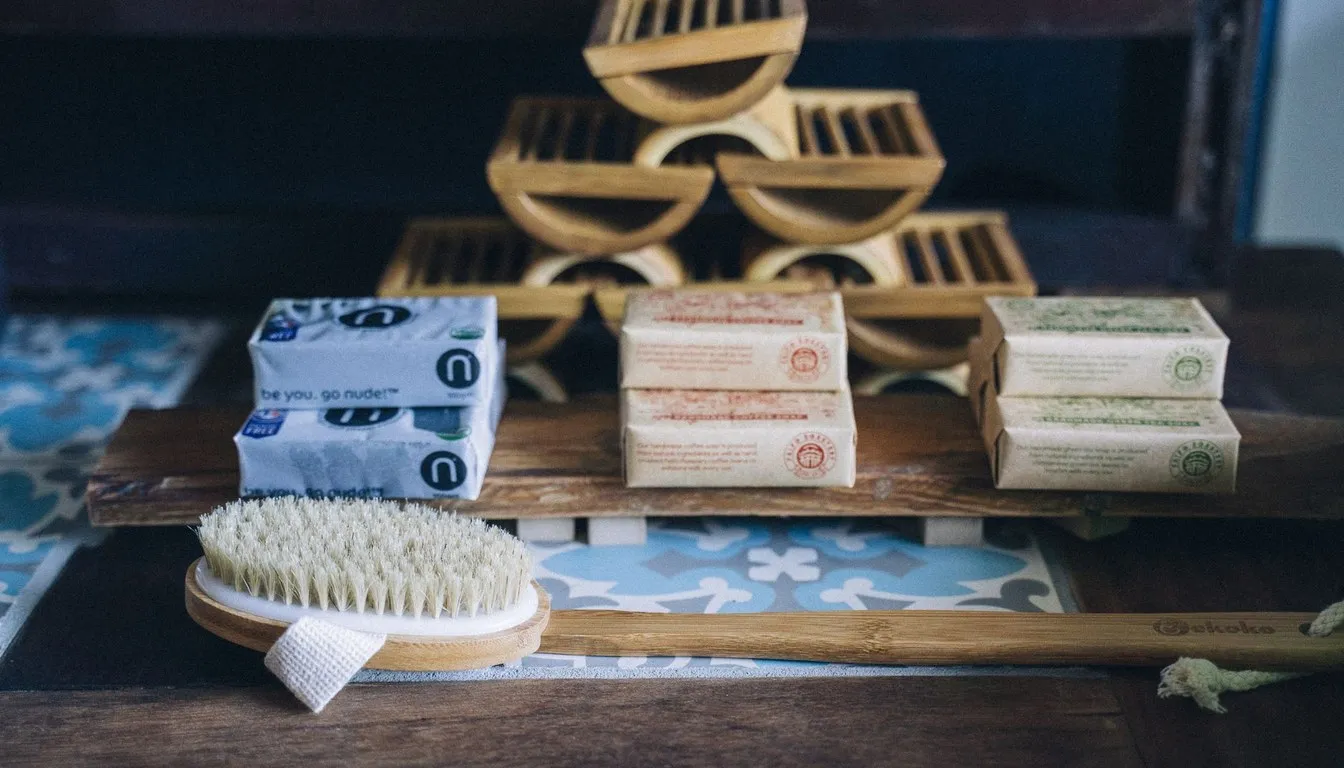 Shoe brush and soap bars on a wooden rack