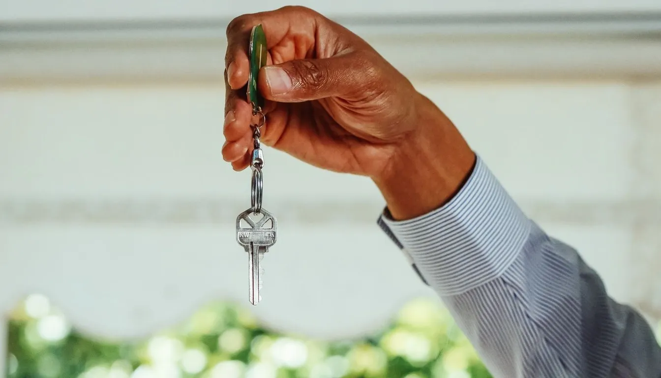 Hand holding a set of keys