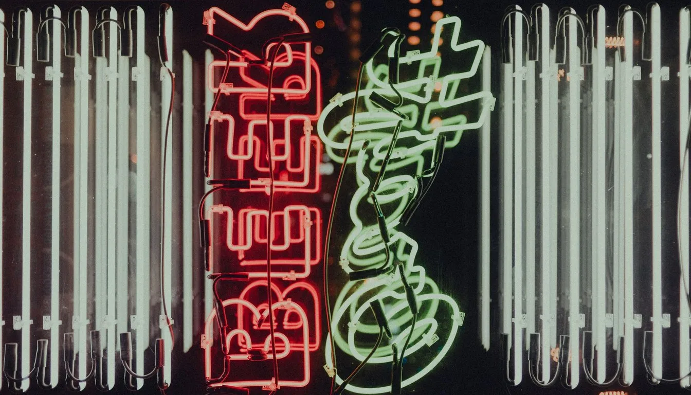 Glowing neon sign tubes in red and green