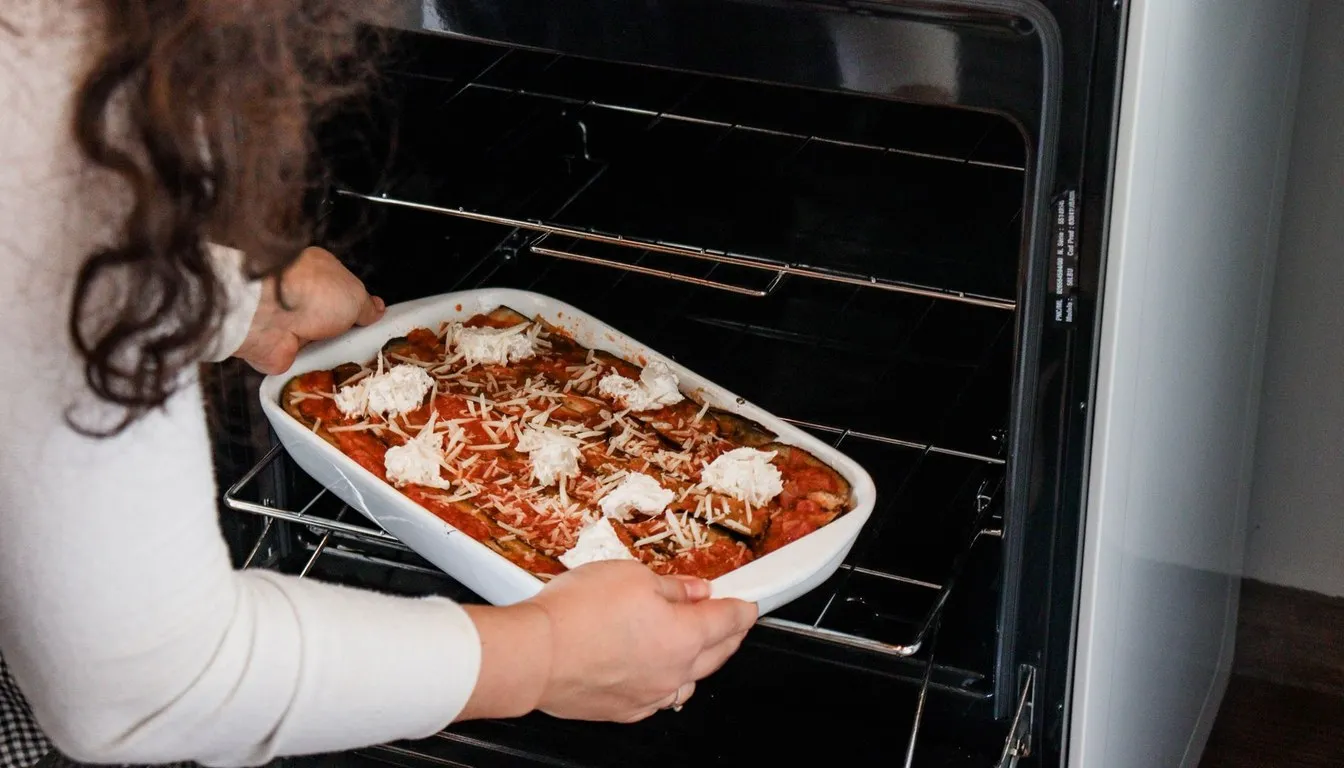 Casserole dish going into an oven