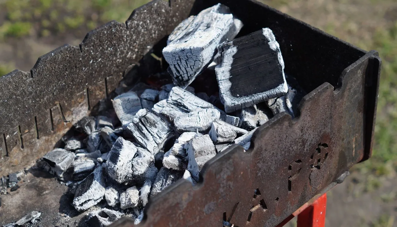 Charcoal burning in a small grill